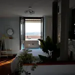 Attico 26